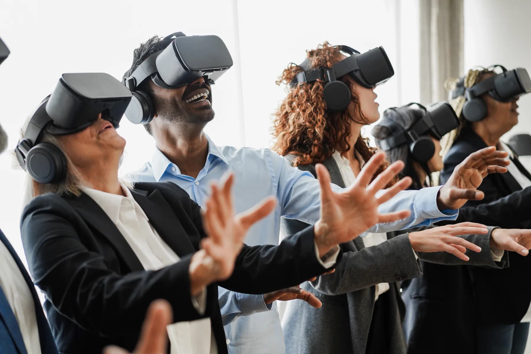 Virtual reality headset station at an event with mirrored display and operator support