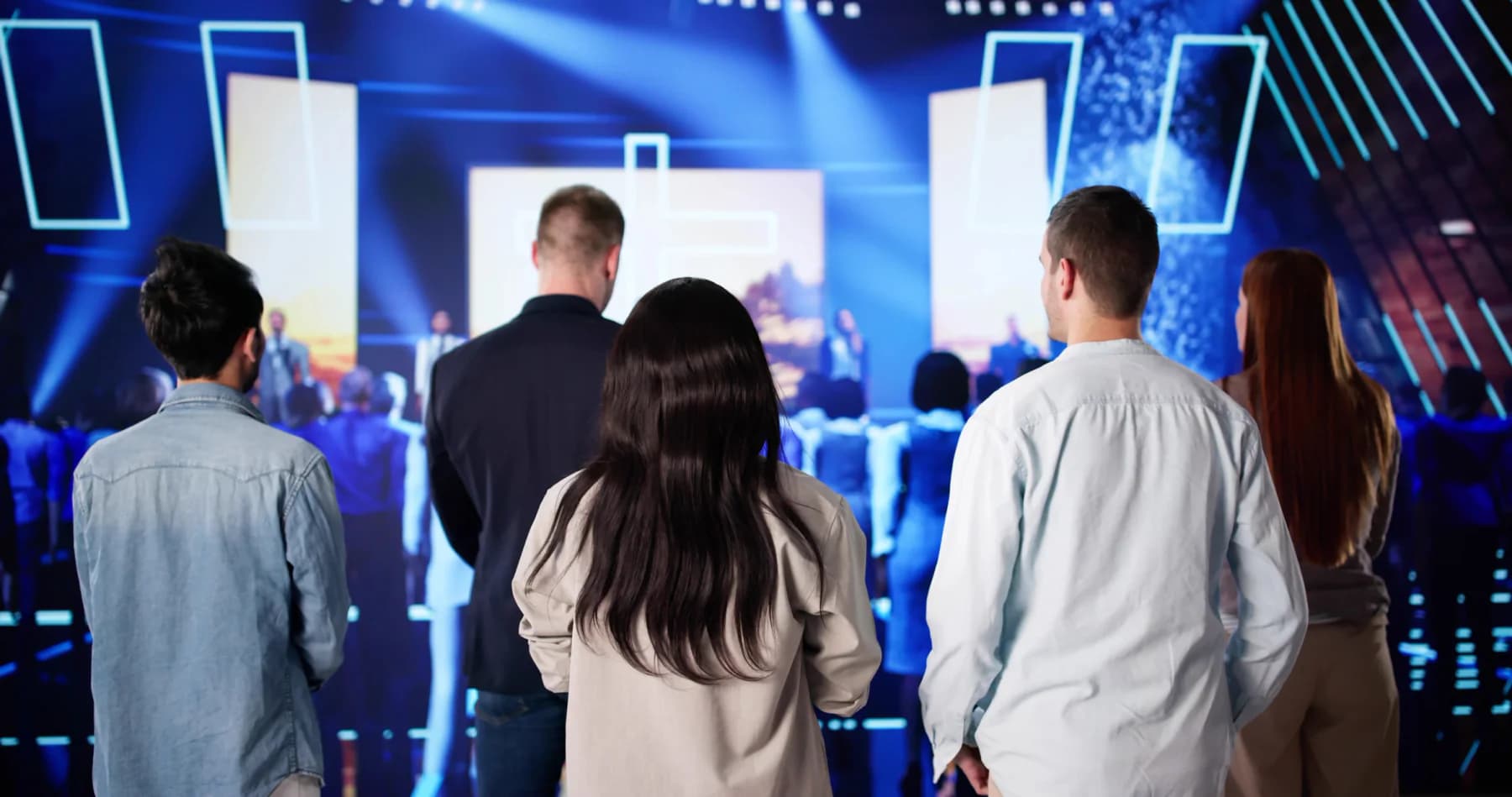 Experiential marketing activation with branded displays and attendees interacting with digital elements