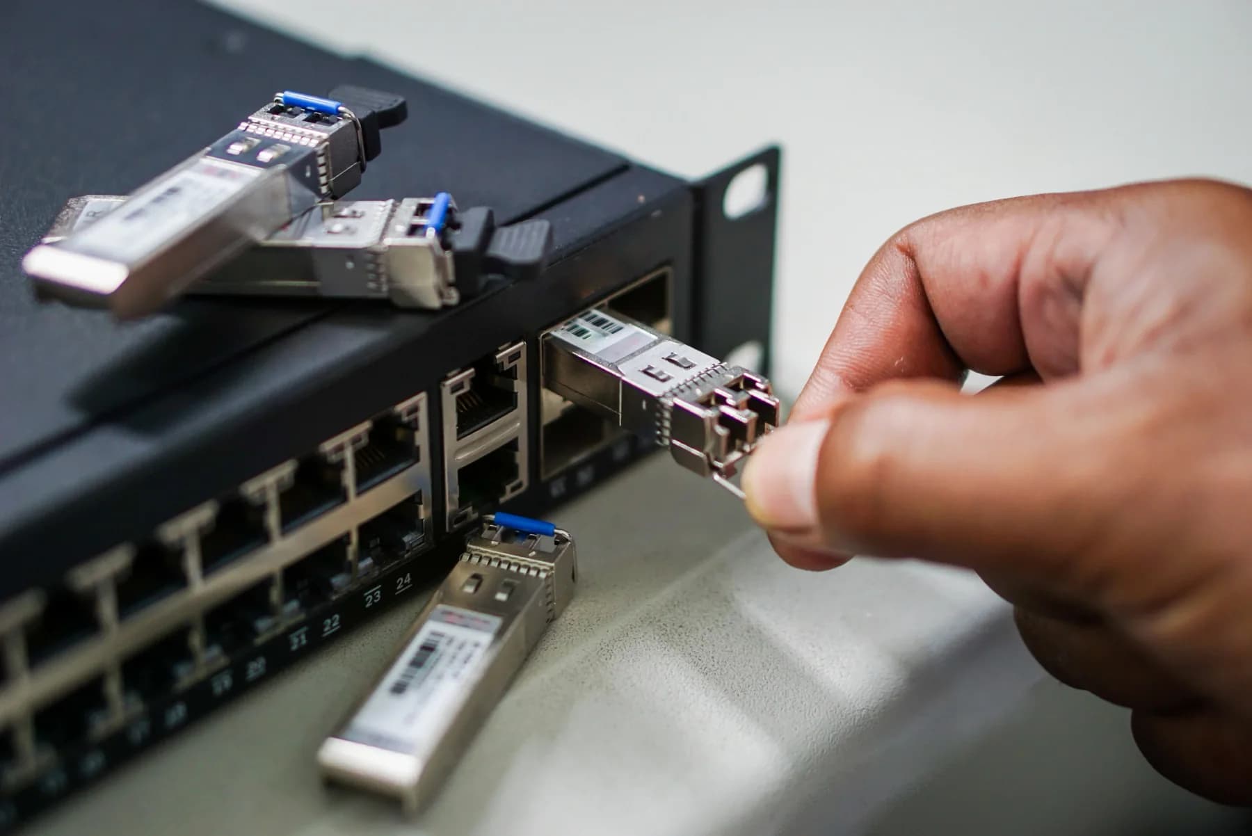 Cisco network switch rentals installed in a rack with patch cables for temporary event lab and business network deployments