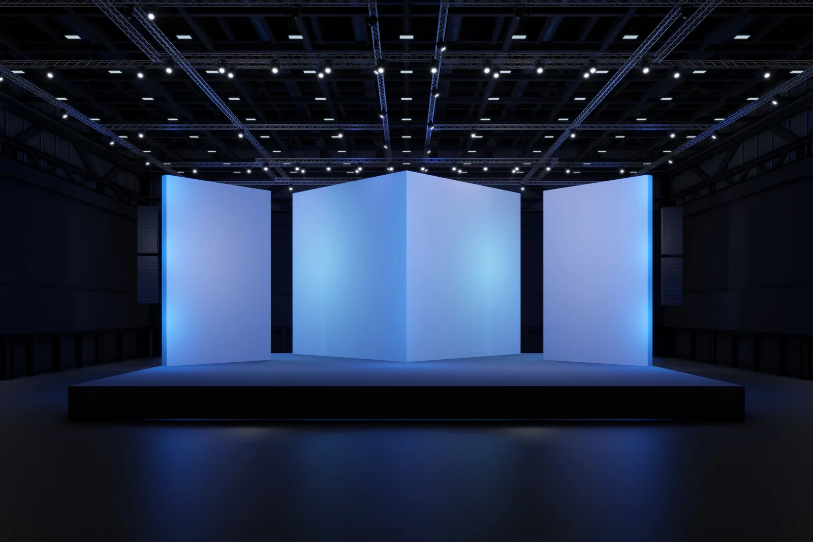 Multi panel video wall in a large event space displaying bold branded content