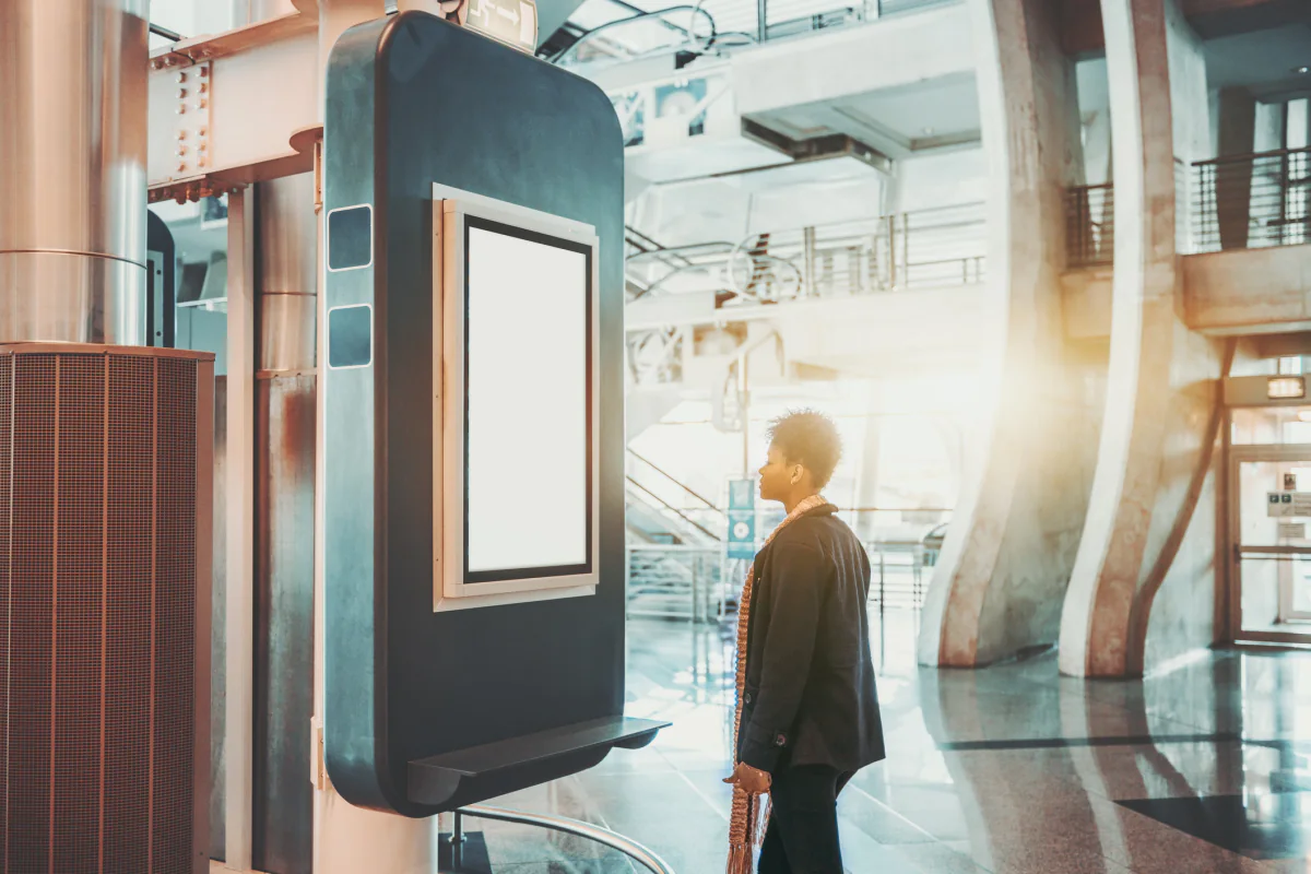 Directional digital signage helping attendees navigate a hotel conference floor and breakout room layout