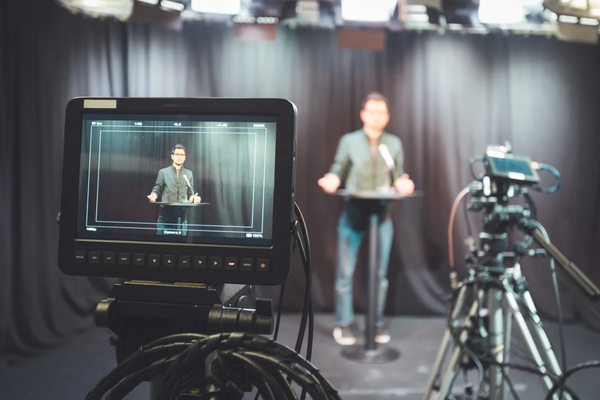 Single camera recording setup used for keynote capture training sessions and business event documentation