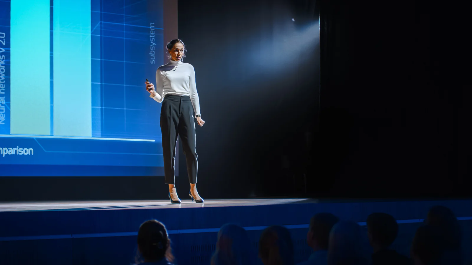 Awards stage with lighting and podium for ceremony presentation and audience visibility