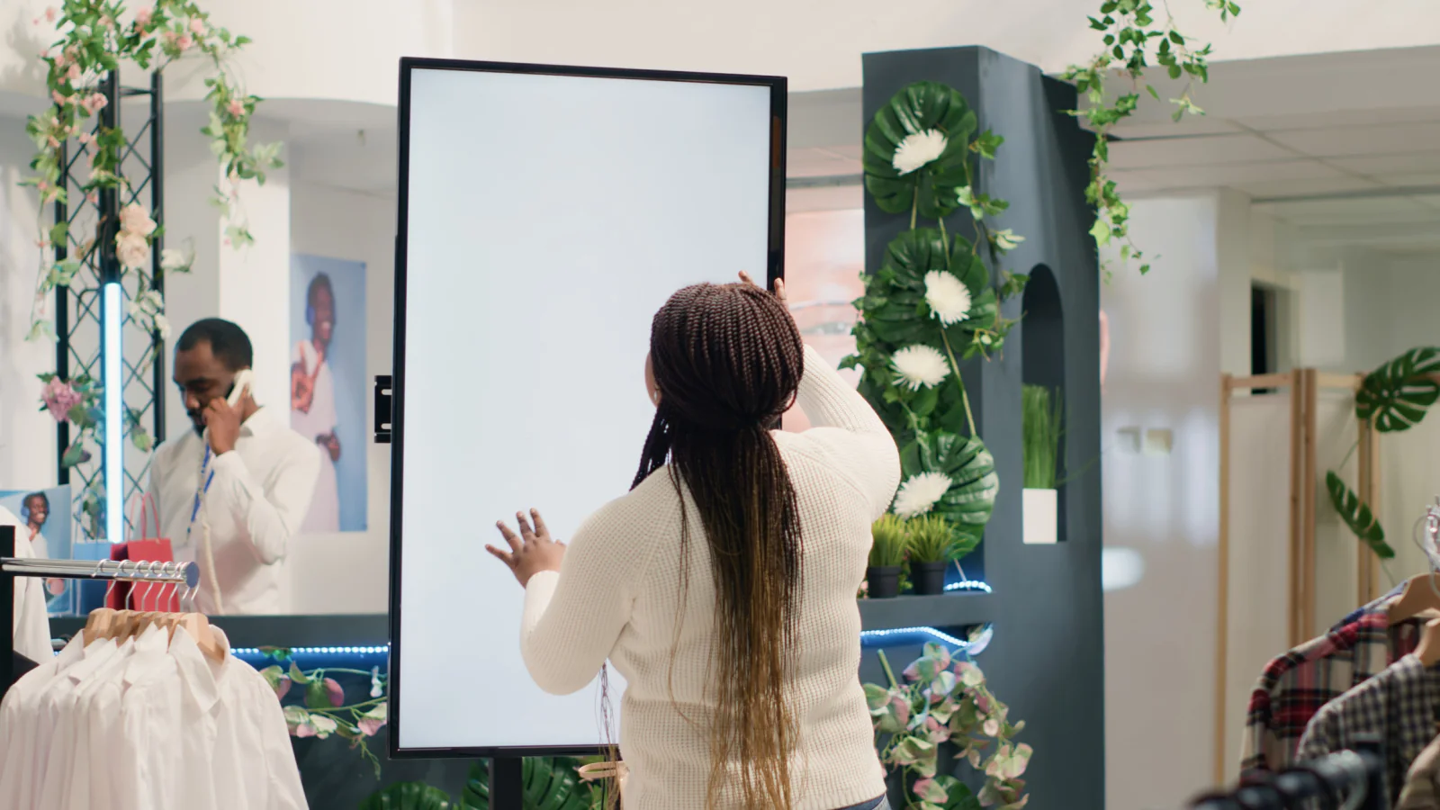 Large touchscreen display used by a group for collaboration brainstorming and presentation work