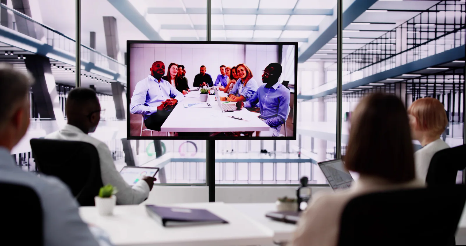 Corporate training room using a large television at the front for presentation and instruction