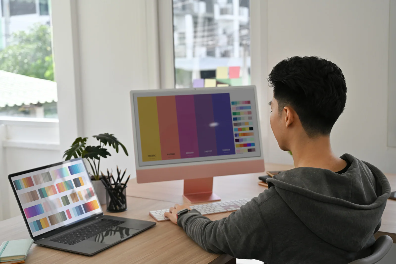 Executive Apple event environment with MacBook, iPad, display, and polished presentation setup for a high visibility business program