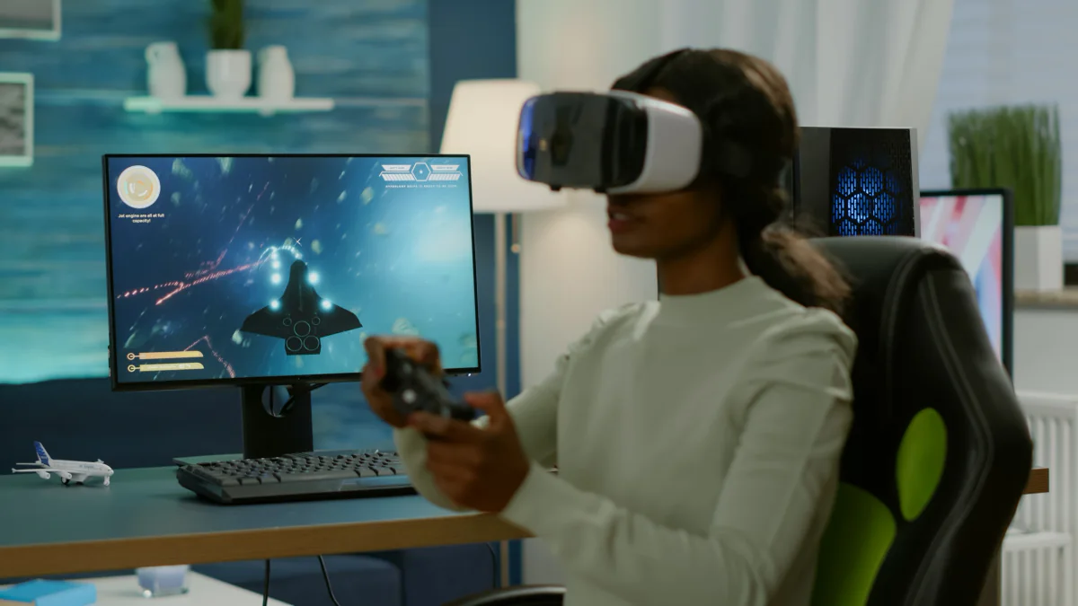Featured VR demo station with gaming desktop, headset, mirrored display, and event-ready setup