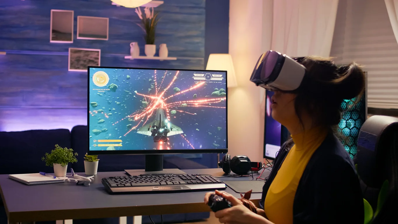 Virtual reality headset station connected to a gaming desktop for immersive event demos