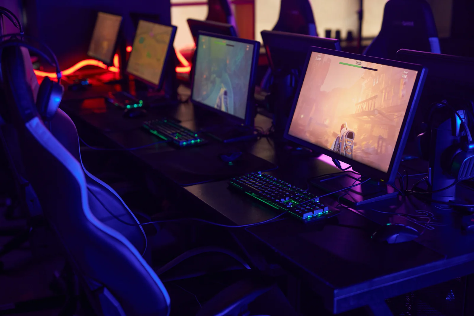 Event demo station with gaming monitors used for attendee engagement and branded product demonstrations