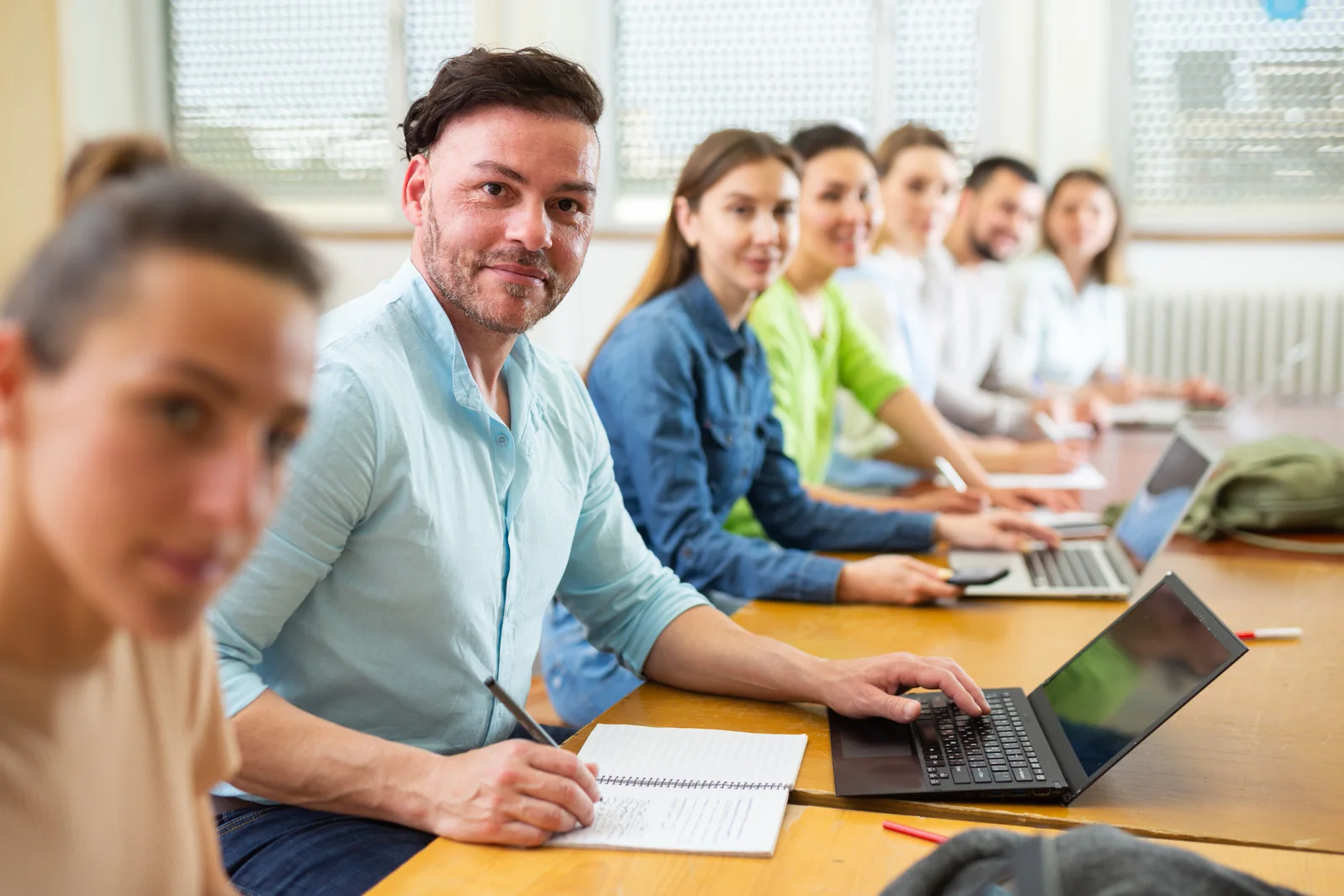 Training bootcamp with participants using rental laptops in a classroom configured for recurring sessions