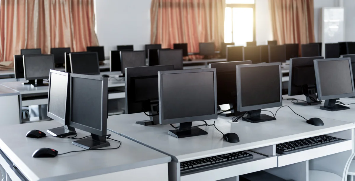 Preconfigured rental laptops staged for delivery with testing software installed and devices ready for an upcoming exam or training session