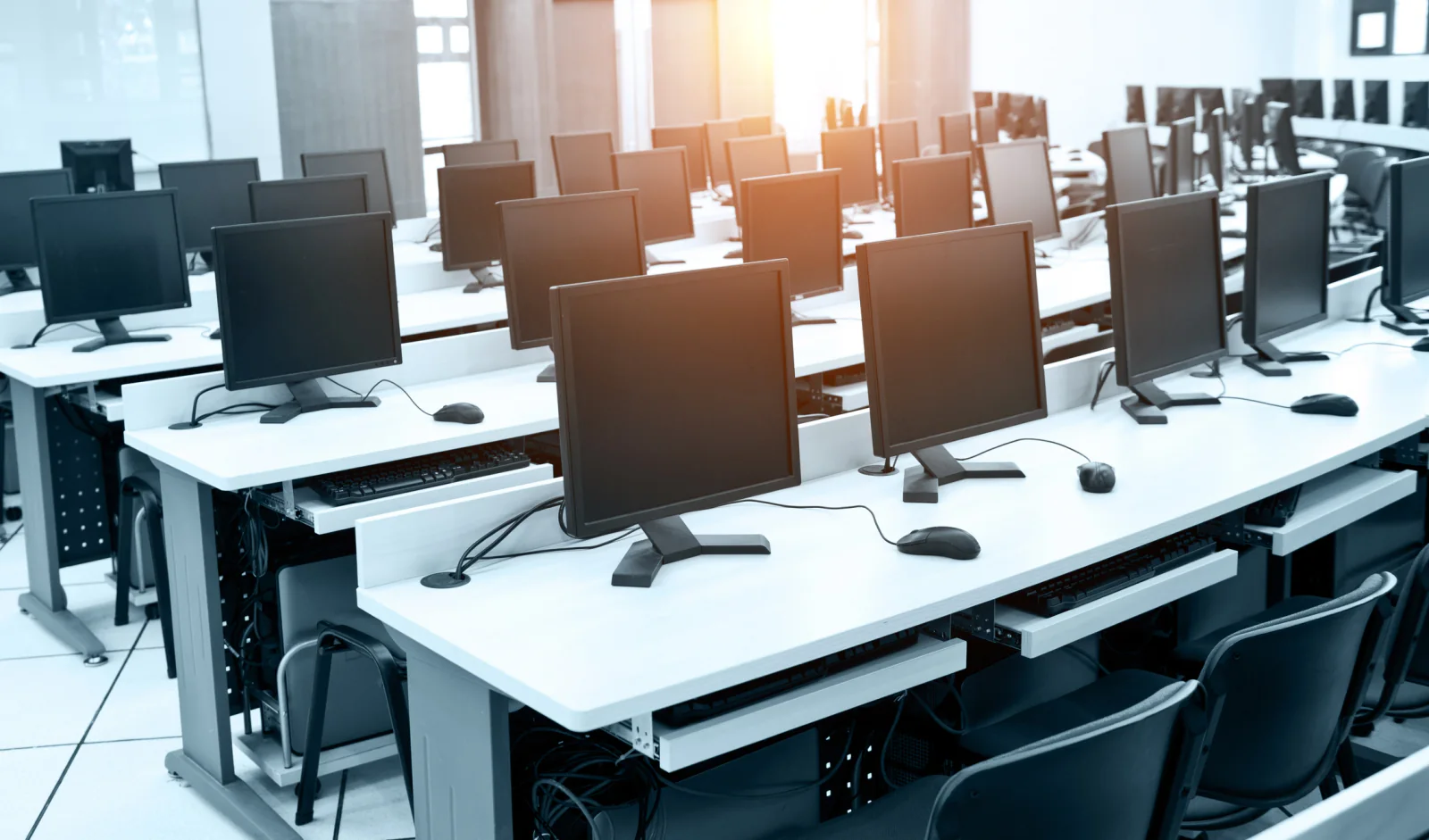 Multi site testing program with standardized rental laptops and shipping-ready device fleets for a distributed exam rollout