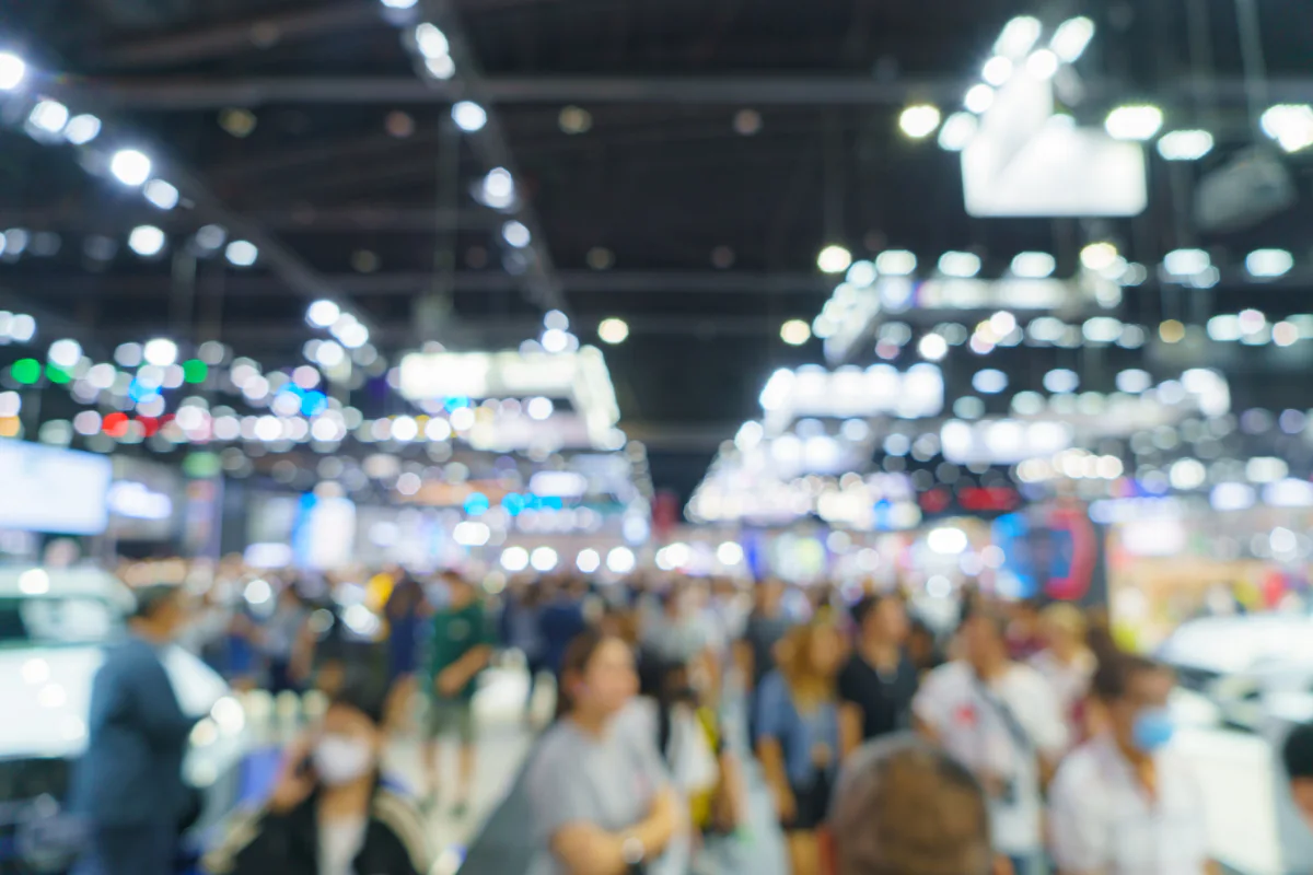 Standardized trade show booth technology package with rental displays tablets laptops and branded demo stations repeated across events