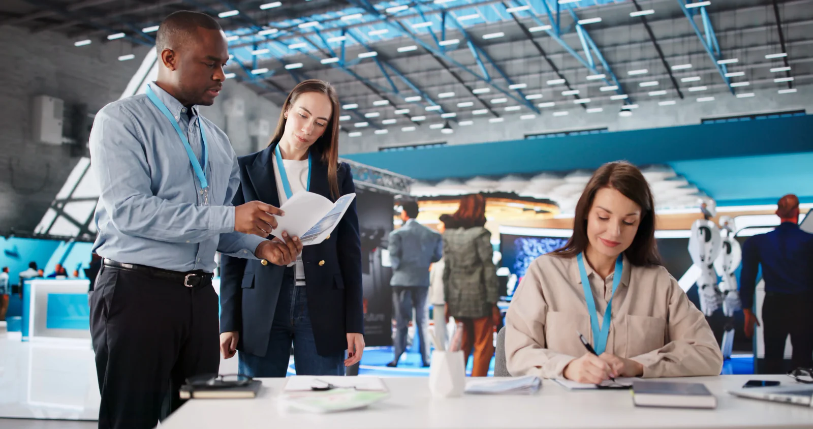 Exhibitor using rental tablet and badge scanning technology in a trade show booth with hotspot connectivity for lead capture