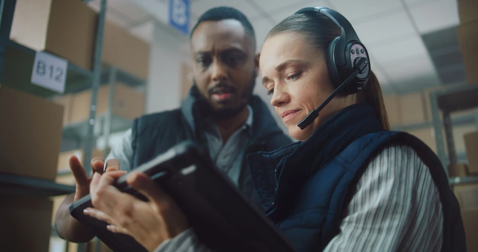 Field organizers using laptops and tablets to coordinate canvassing volunteers and routes