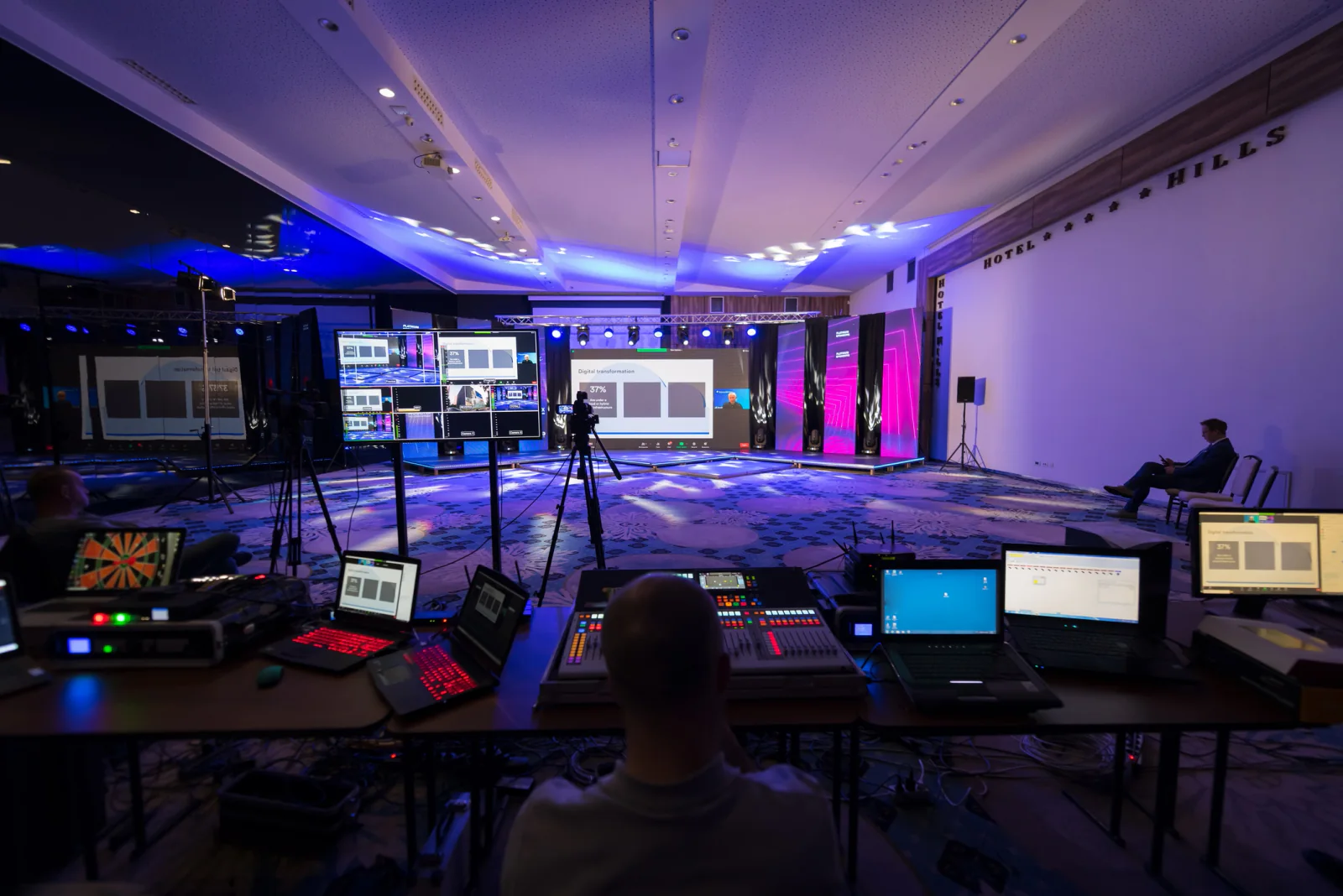 Streaming encoder and capture hardware on a table connected for live event video production and remote delivery