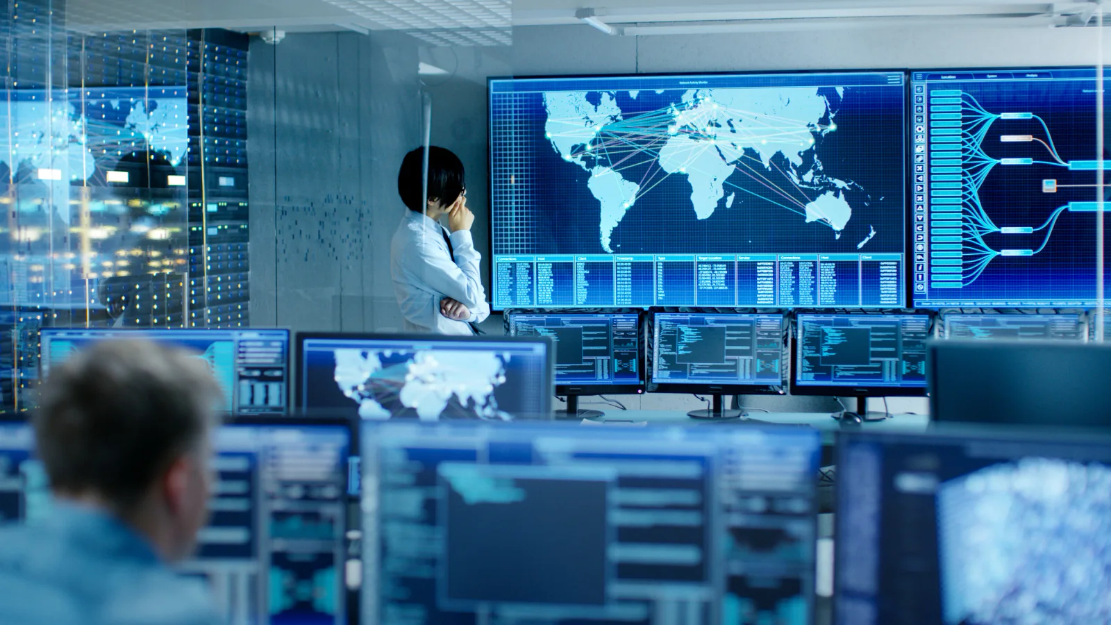Remote field office with supervisors and engineers using laptops in an energy operations environment