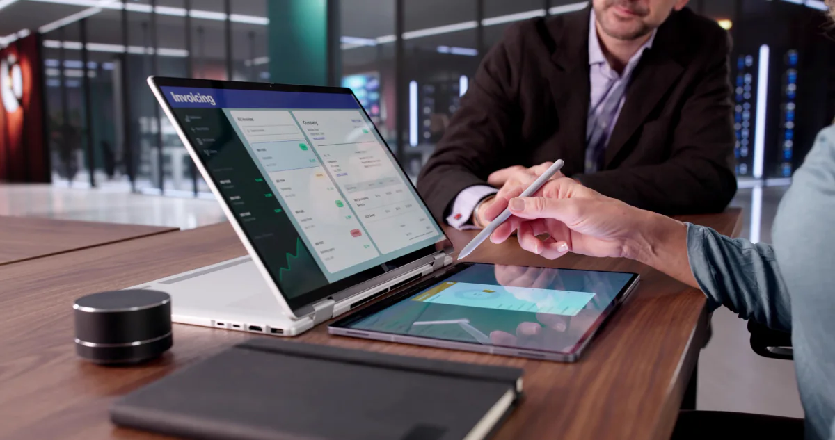 Premium Microsoft Surface laptops arranged for executive meetings and business presentations