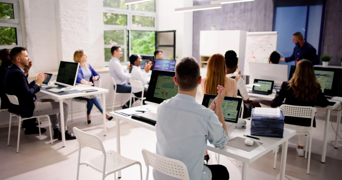 Temporary classroom with Chromebook laptops on student desks for school and workshop use
