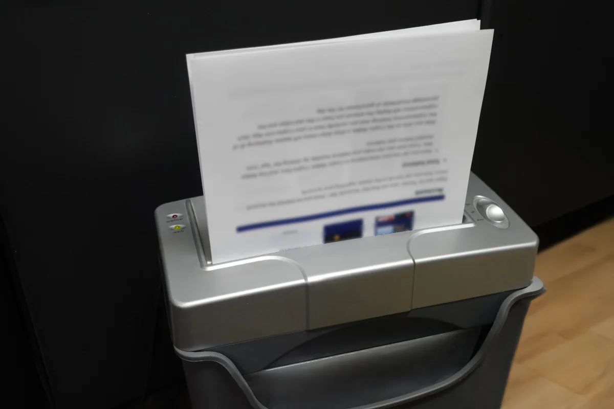 Compliance-focused document shredding in an office environment with secure disposal procedures