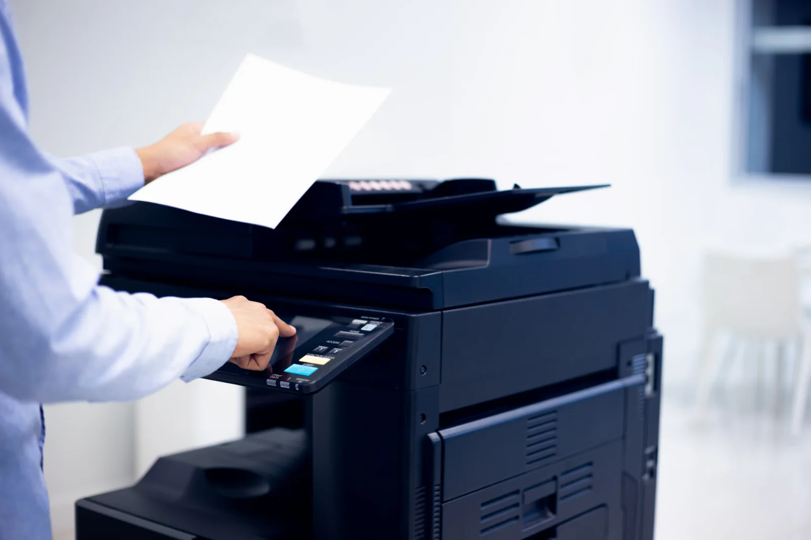 Document scanner with stacks of paper being scanned for records conversion and office digitization workflows