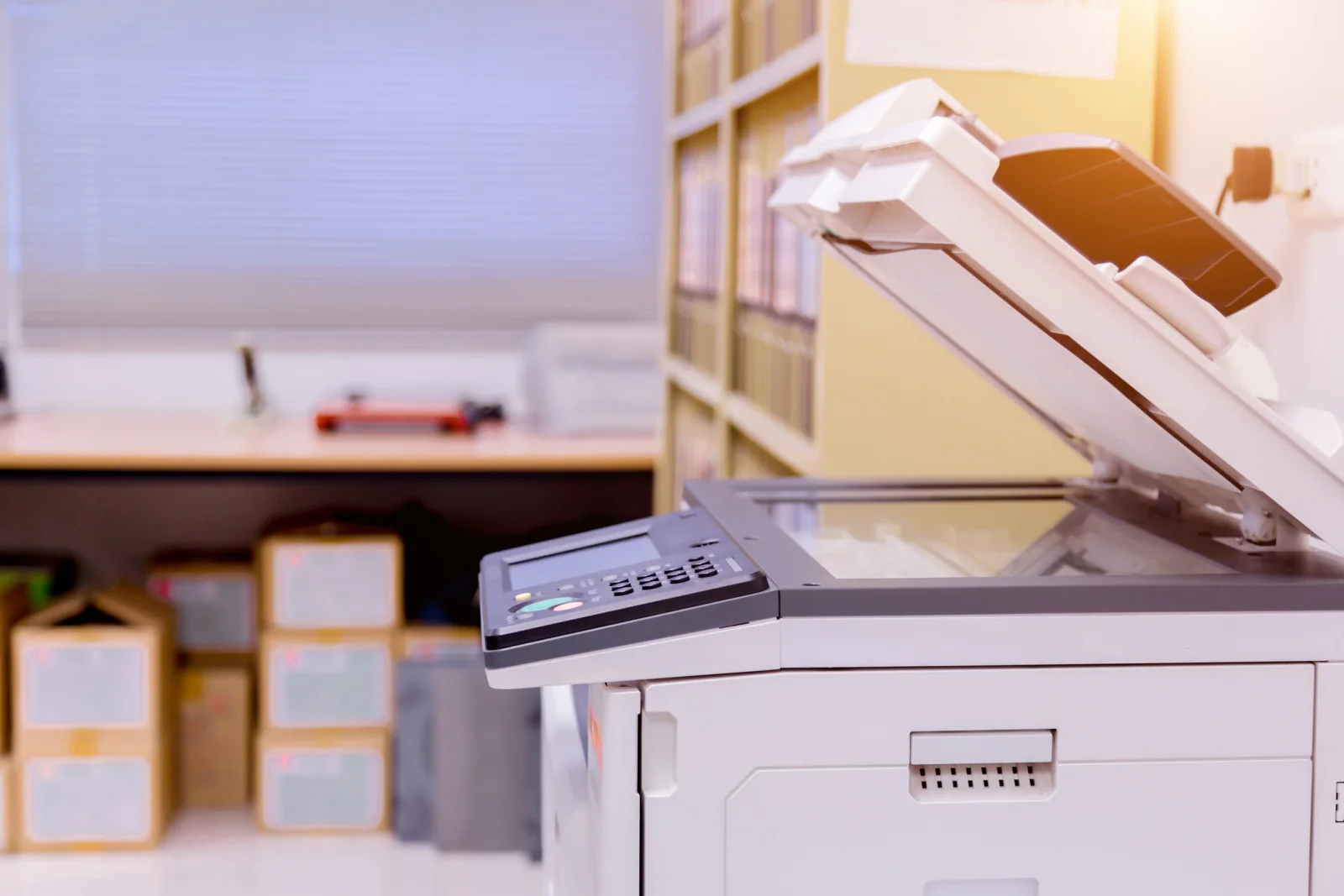 Event or intake desk with a scanner used for ID scanning and temporary document intake workflows