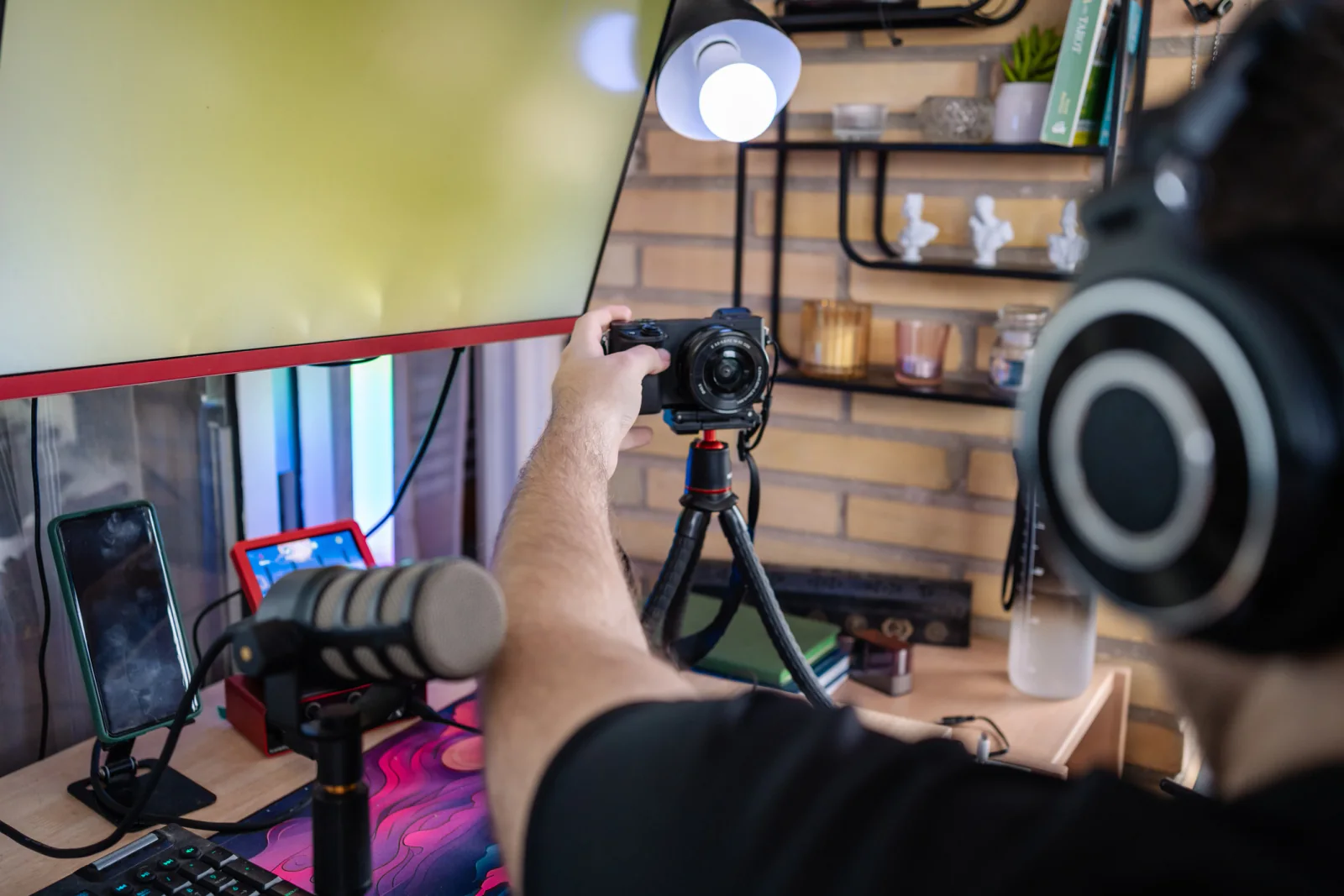 Capture device and cables near a production setup for streaming, esports, and event media workflows
