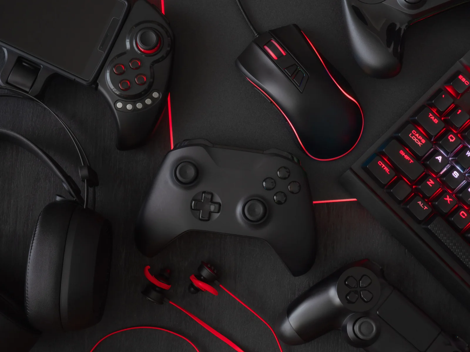 Game controllers arranged on a table for tournament stations, gaming lounges, and demo environments