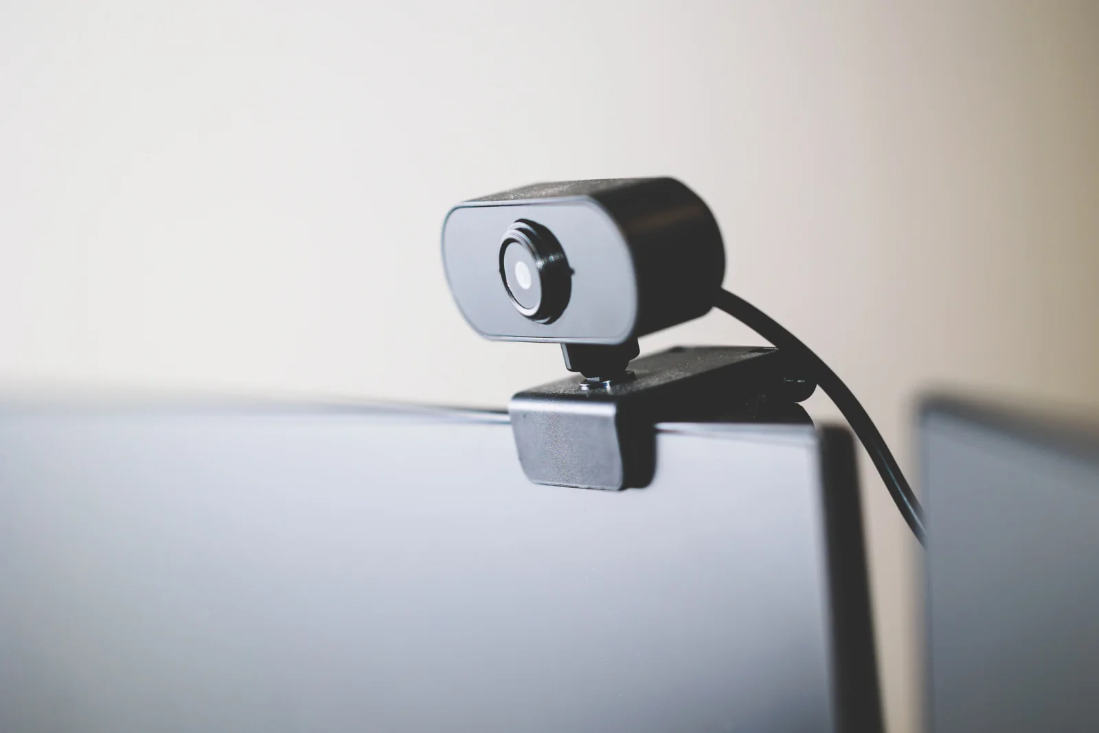 Webcam mounted on a monitor for streaming, hybrid events, and content capture workflows