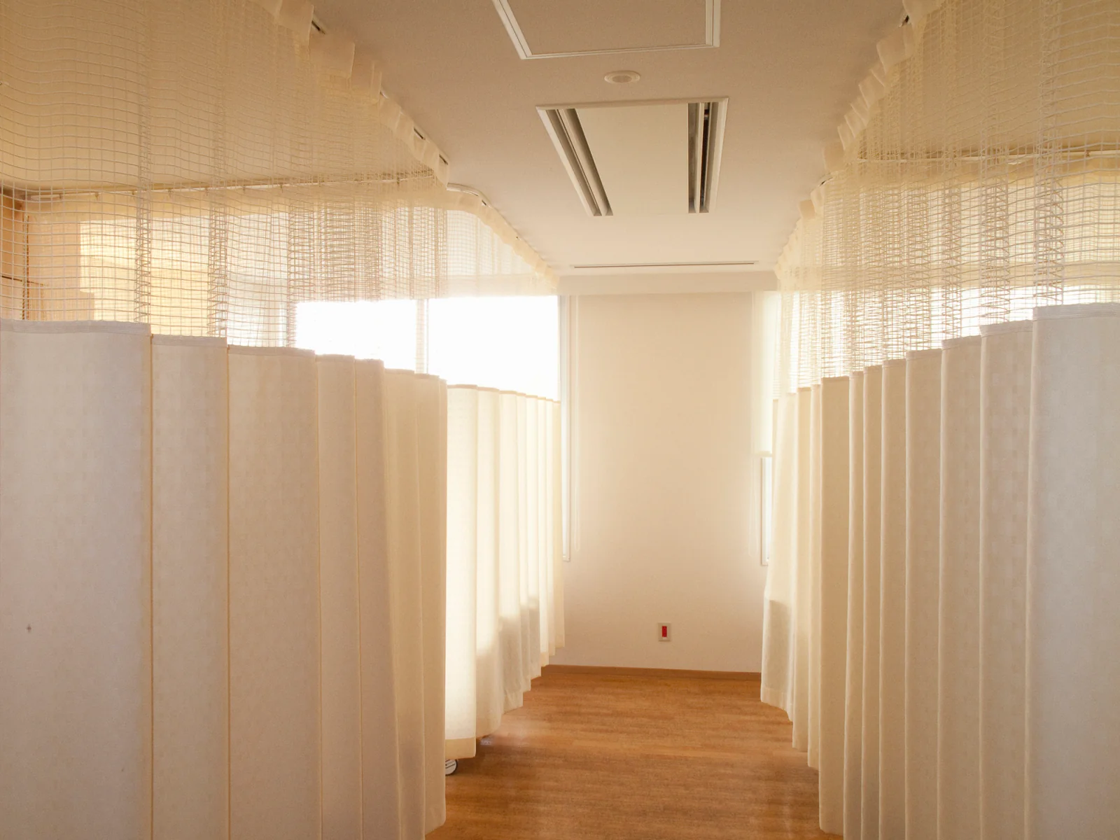 Pipe and drape room divider used to separate ballroom breakout spaces and hide support areas
