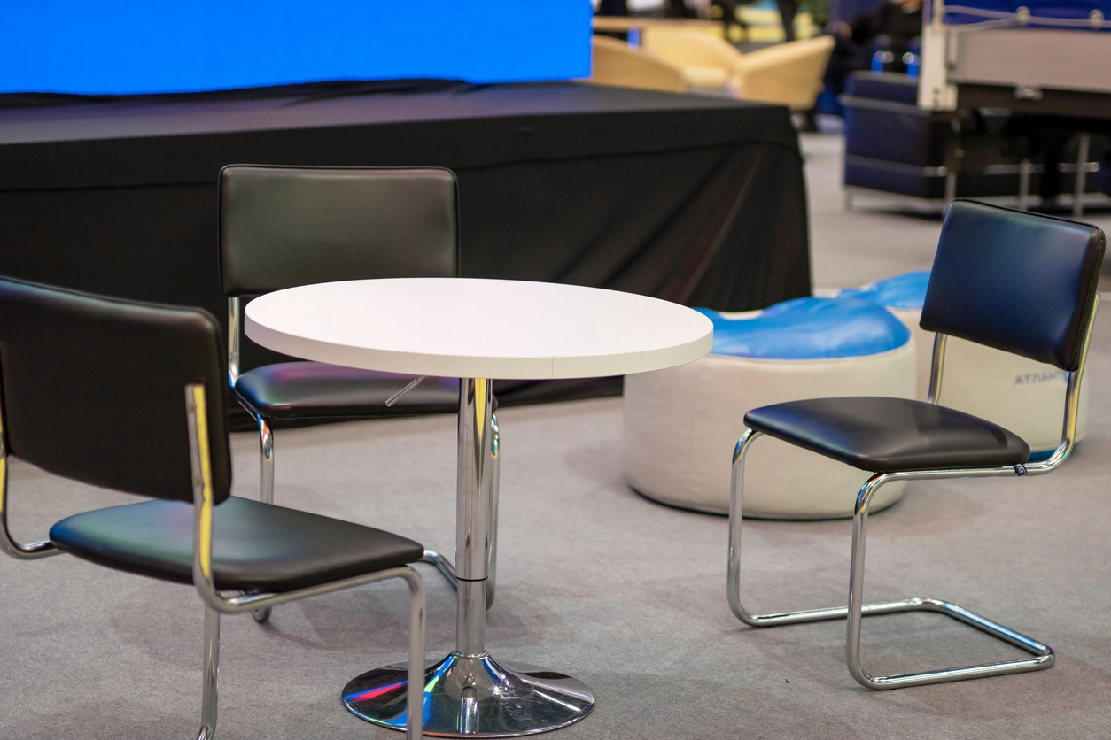 Conference tables and communal bar tables for a corporate event space