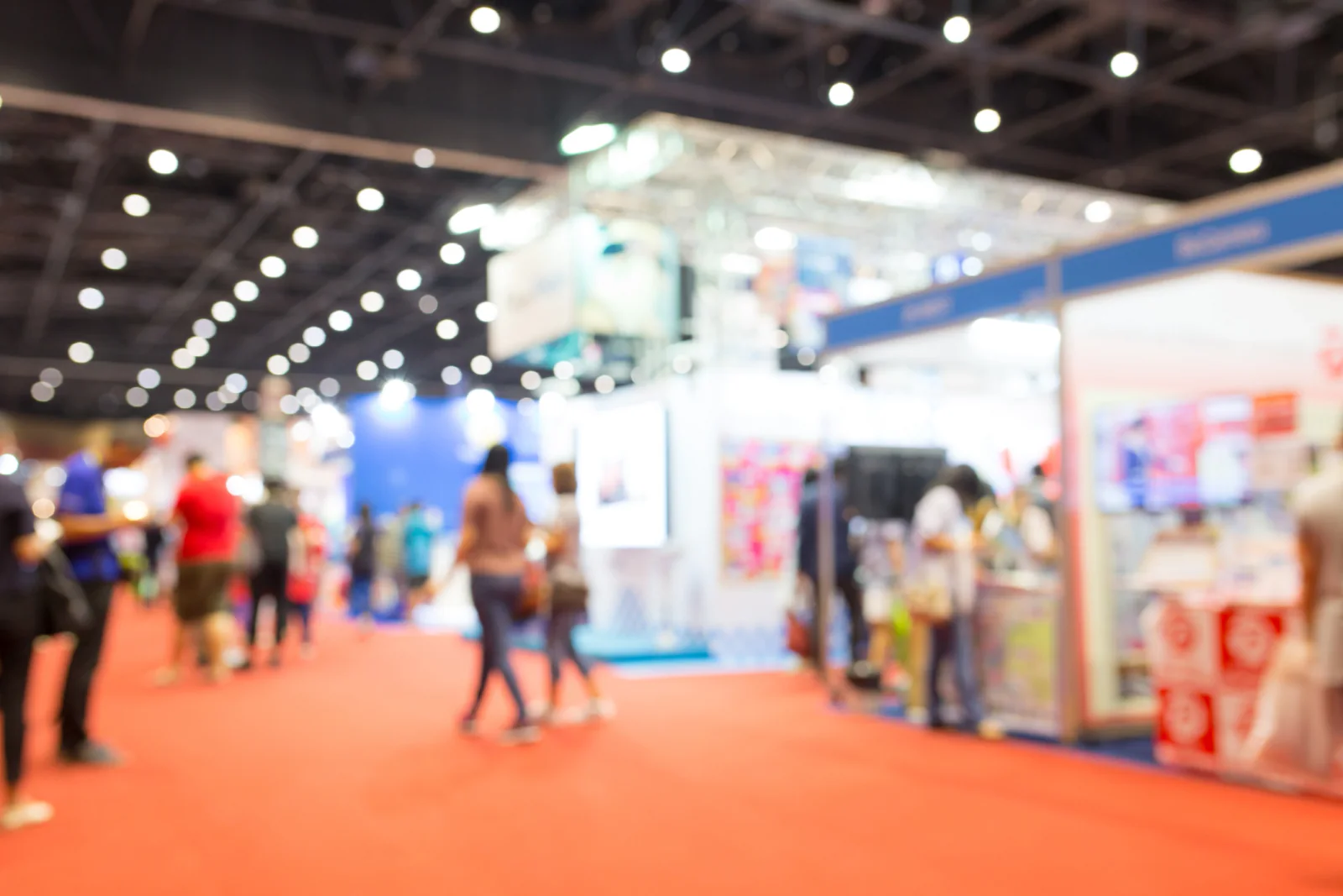 Large trade show and sponsor event environment with rental displays registration technology and multiple supported event zones