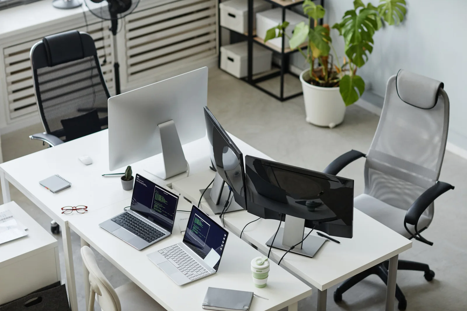 Multi-location deployment of standardized office equipment kits across several business sites with coordinated logistics planning