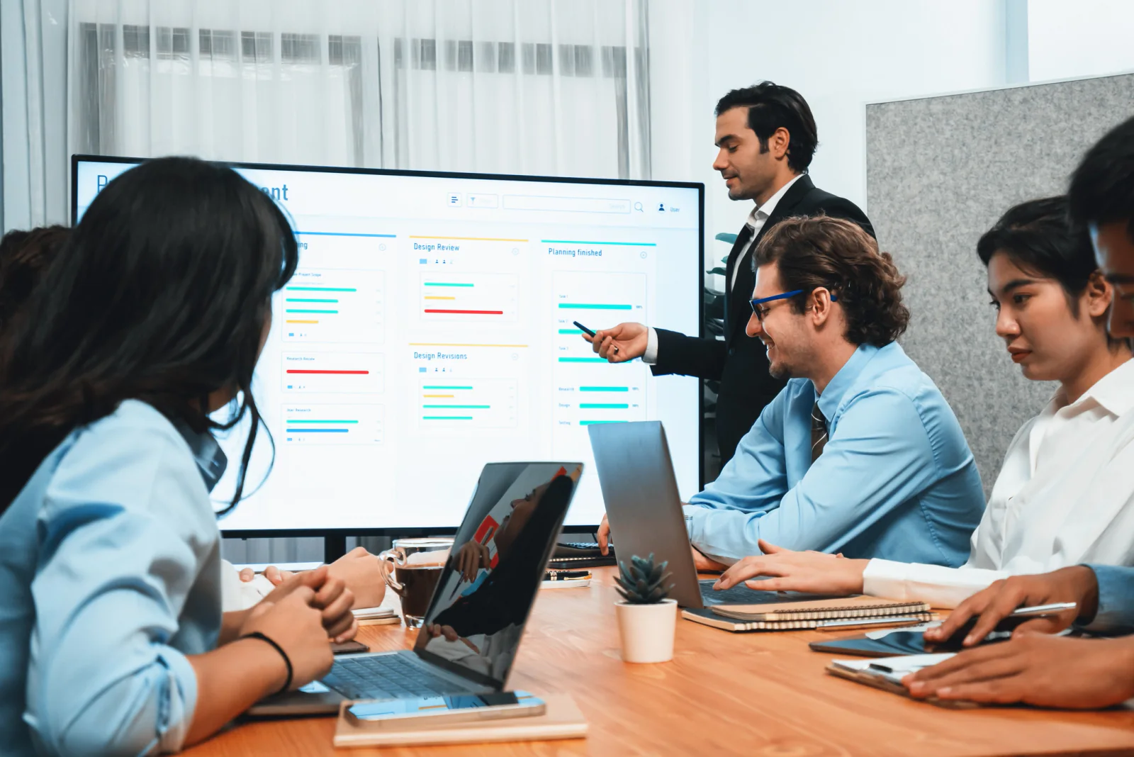 Multi-room conference presentation setup with matching screens, laptops, cables, and consistent AV support across breakout rooms