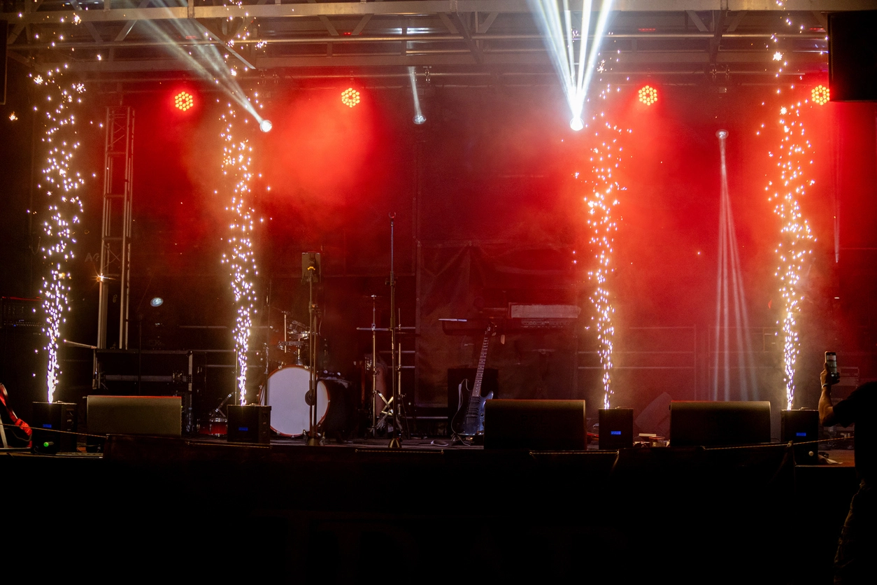 Live event stage using professional lasers cold spark effects lighting and atmospheric visual effects