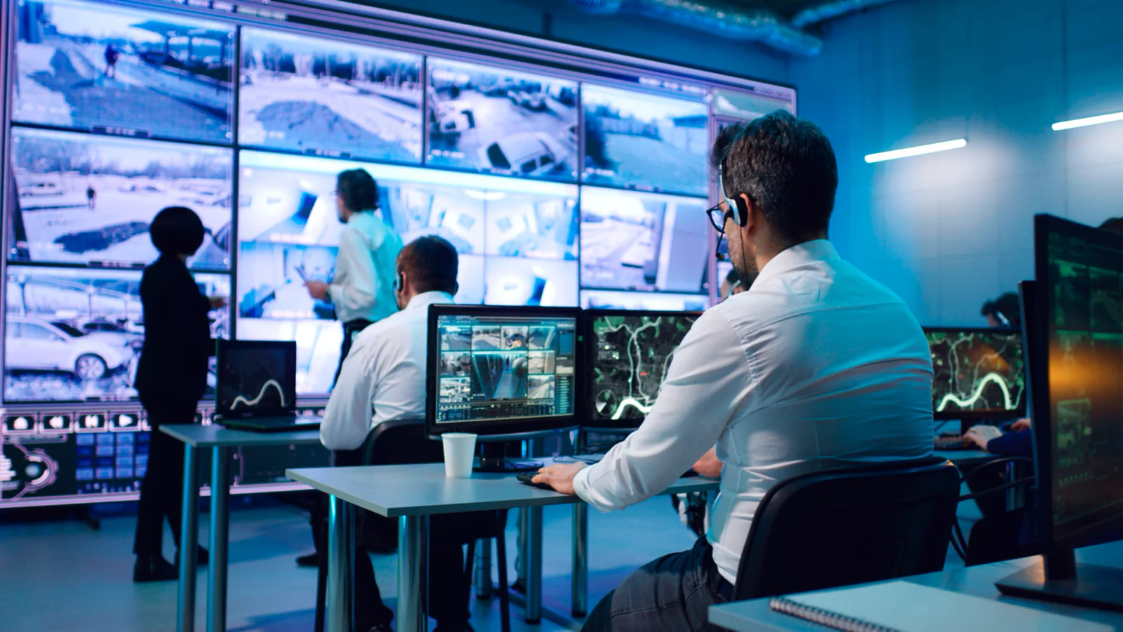 Hybrid event production control area with streaming workstation, recording monitors, stage feed management, and support equipment for live and remote audiences