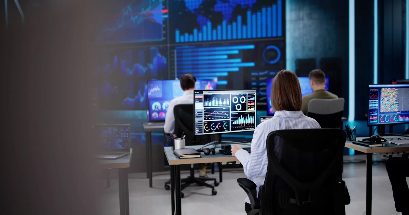 Business video recording setup for training or webinar content with laptop workstation, support monitors, and session capture workflow