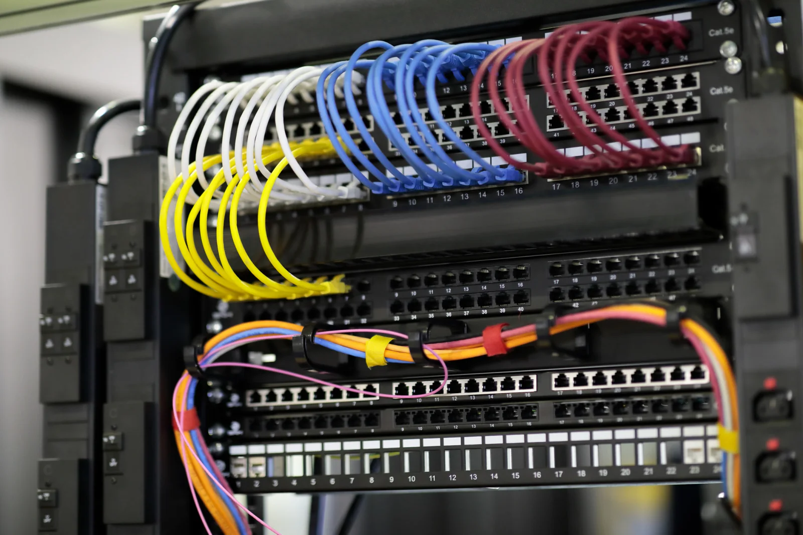 Access switch rentals mounted in a network rack with patch panels for temporary office and event edge connectivity