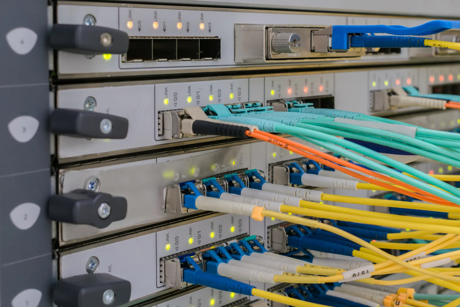 Engineers working in a network lab with Cisco switch rentals servers and test equipment for validation and proof of concept work
