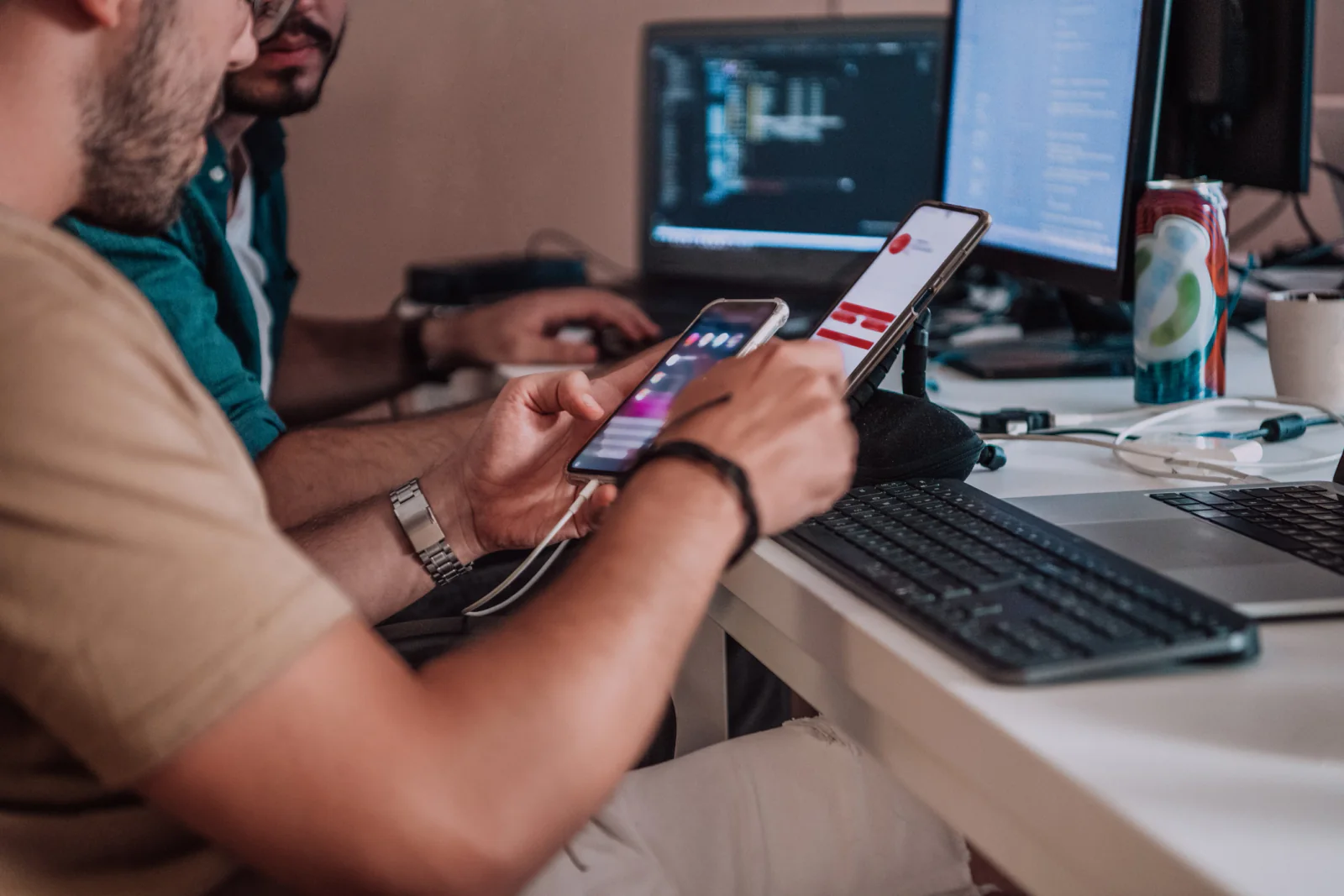 Multiple rental smartphones used by a QA team for mobile app testing compatibility validation and temporary device lab setup