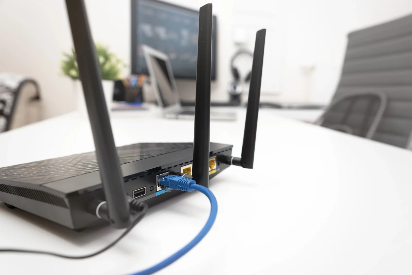 Event technology table with labeled networking gear and a Cradlepoint cellular router uplink for conference connectivity