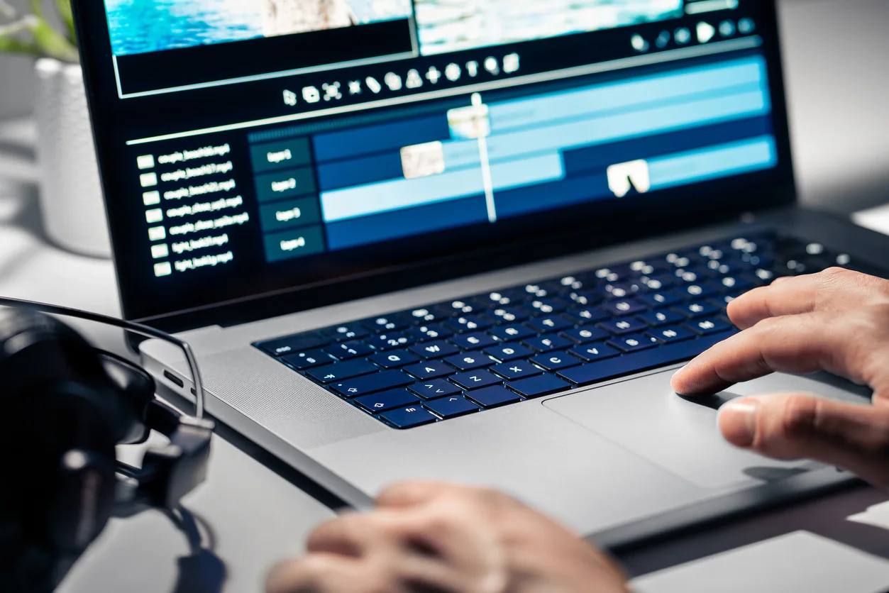 Video scaler connected between a laptop and display to correct resolution and signal compatibility at an event