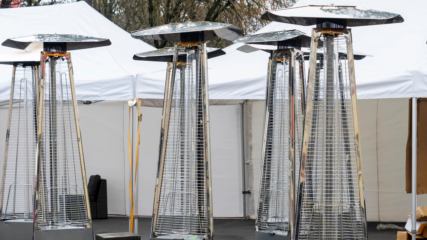 Temporary event heating equipment supporting a professional tented event environment