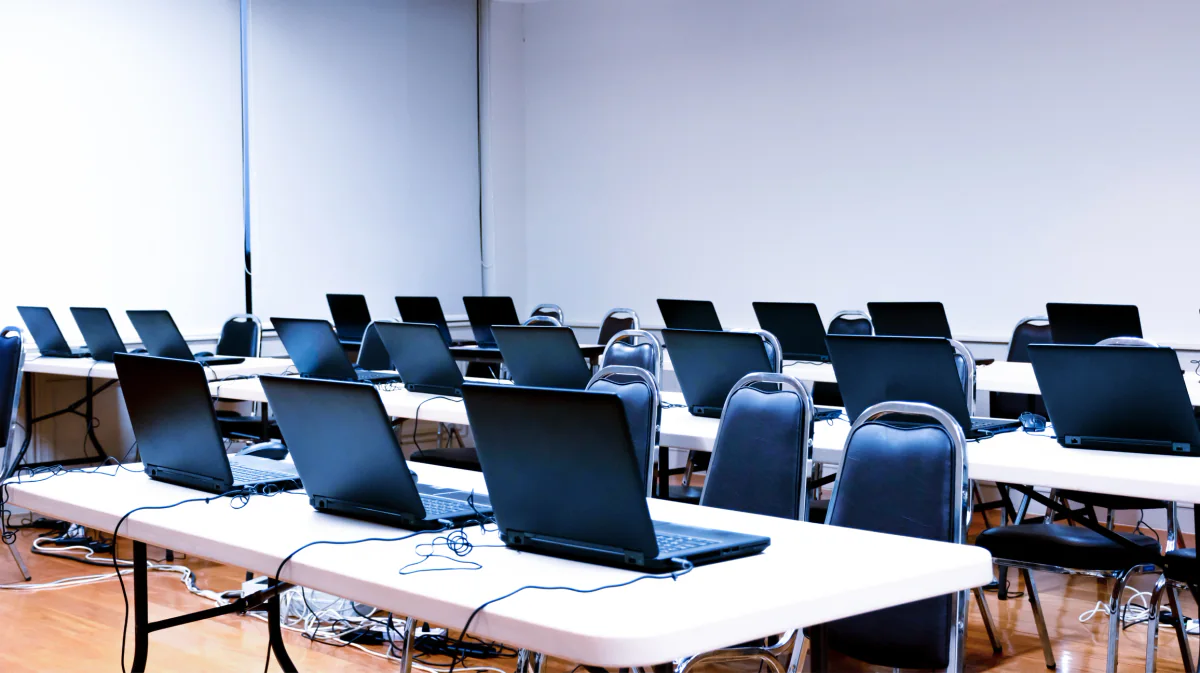 Brand-based rental devices including business laptops, tablets, and accessories arranged for training, events, and short-term business deployments