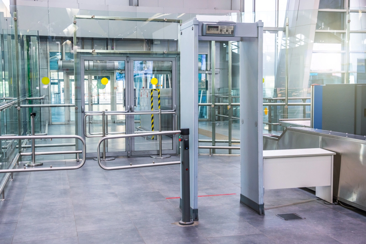 Event security checkpoint using metal detector screening equipment at an attendee entrance