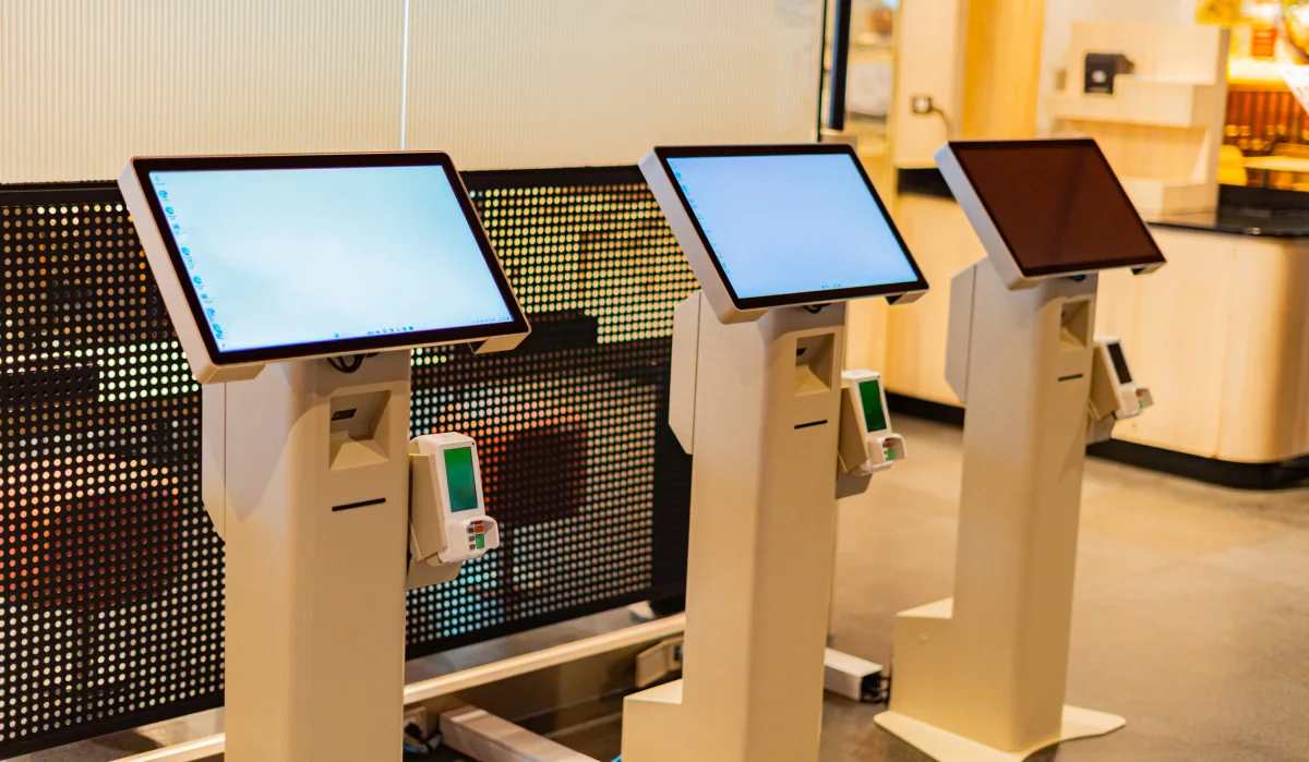 Tablet stands, enclosures, charging accessories, and cases arranged for kiosk and event deployment